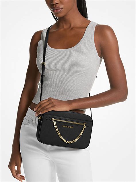 michael kors jet pouch xbody|jet set leather crossbody bag.